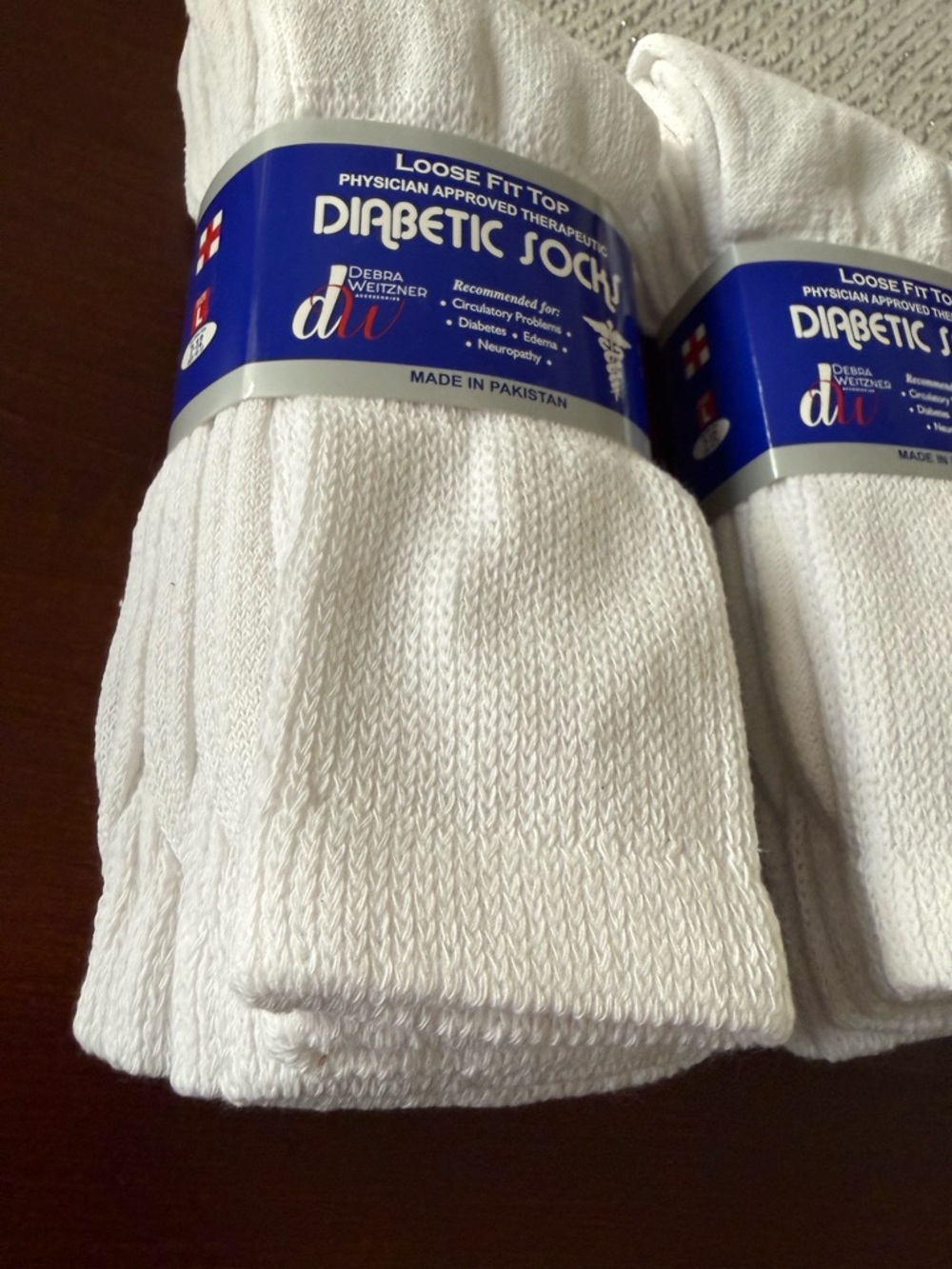 NWT. Pack of loose fit top socks - white. Great for circulatory problems